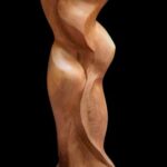 "Enfold" Black walnut wood carving front view